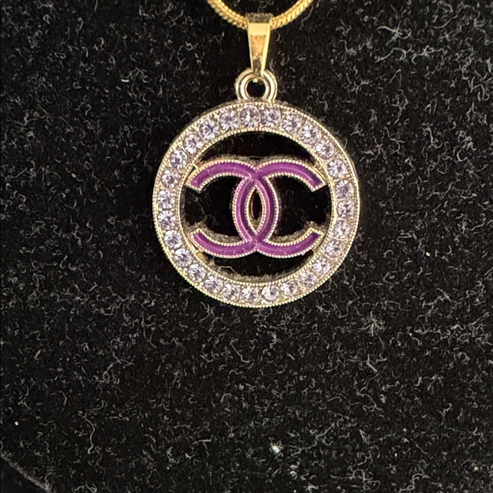Elegant Gold and Purple Pendant